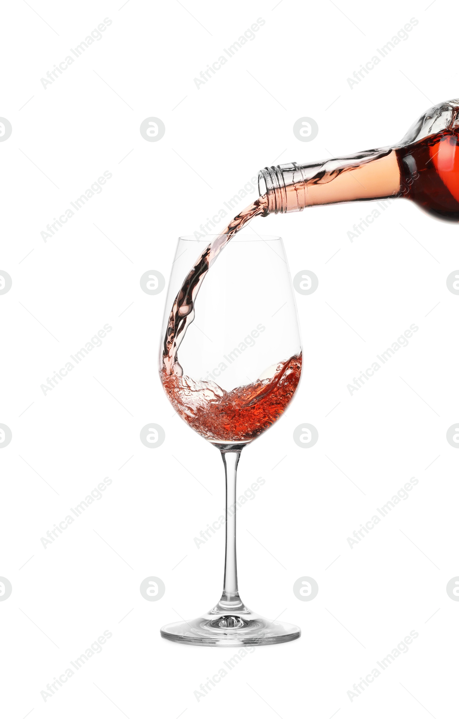 Photo of Pouring wine into glass on white background