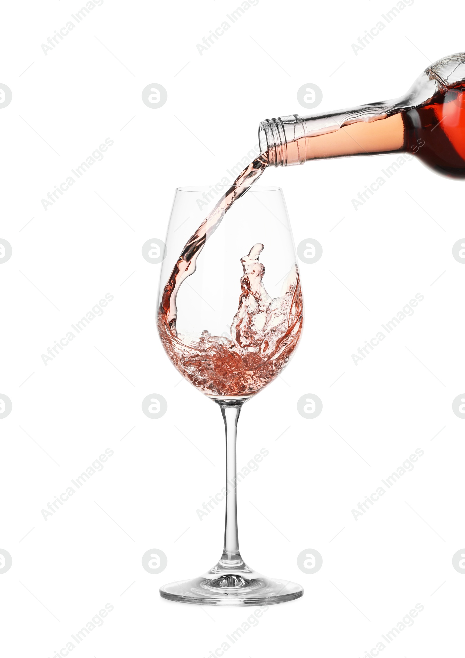 Photo of Pouring wine into glass on white background