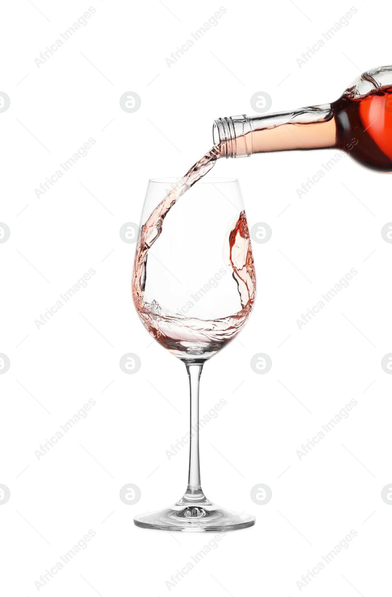 Photo of Pouring wine into glass on white background