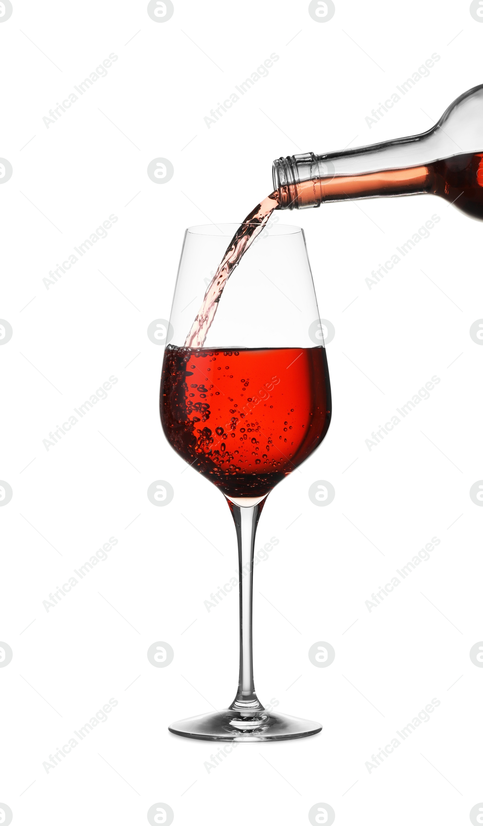 Photo of Pouring wine into glass on white background