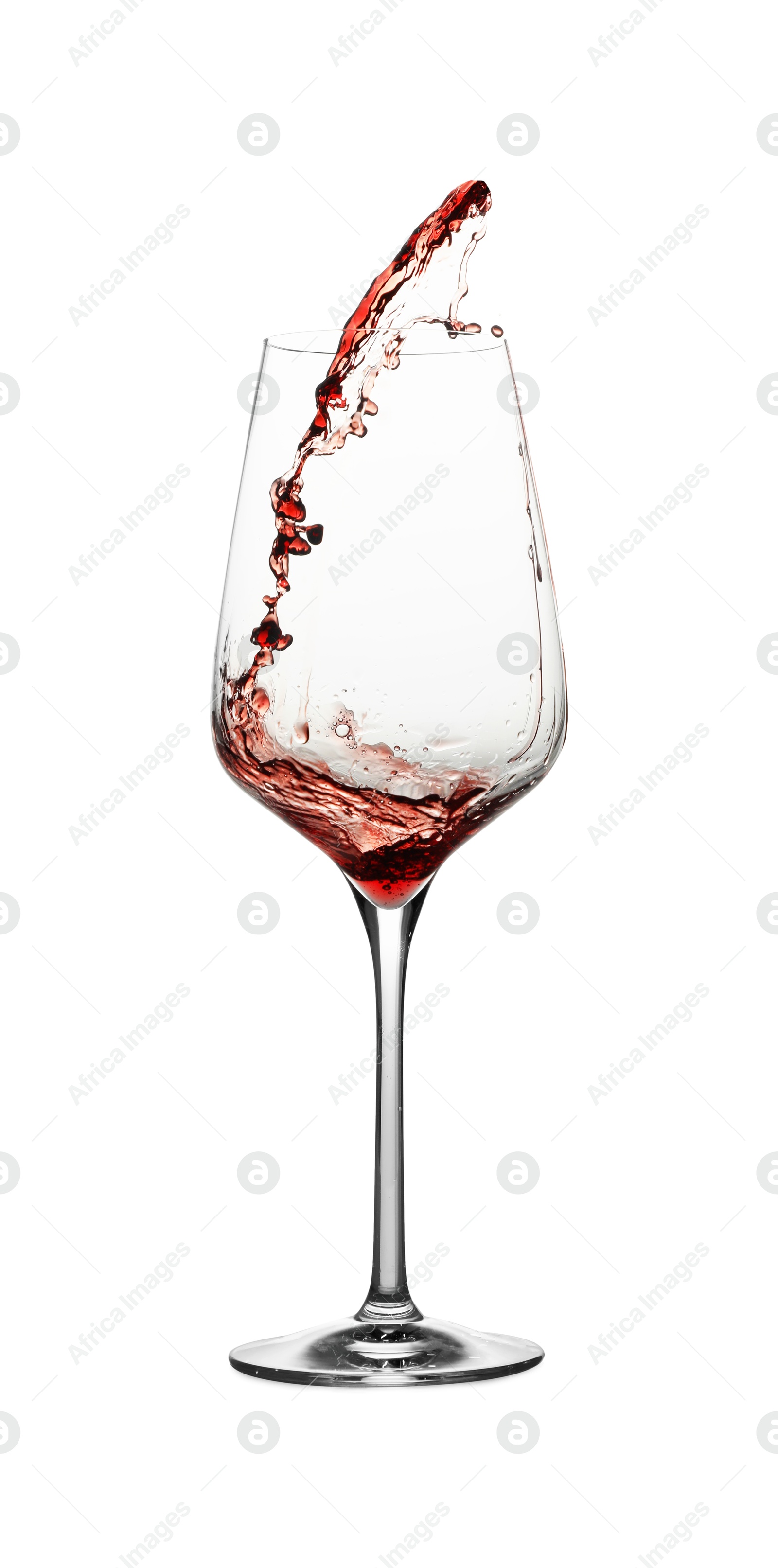 Photo of Tasty wine splashing in glass on white background