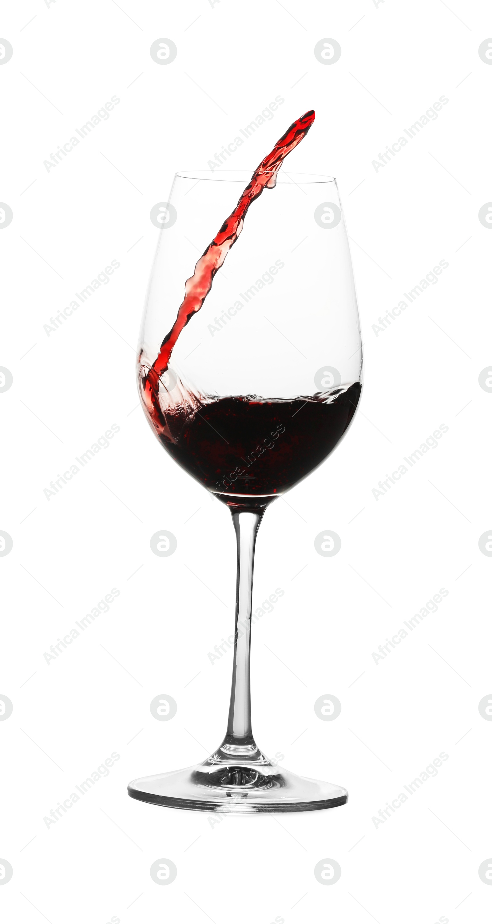 Photo of Tasty wine splashing in glass on white background