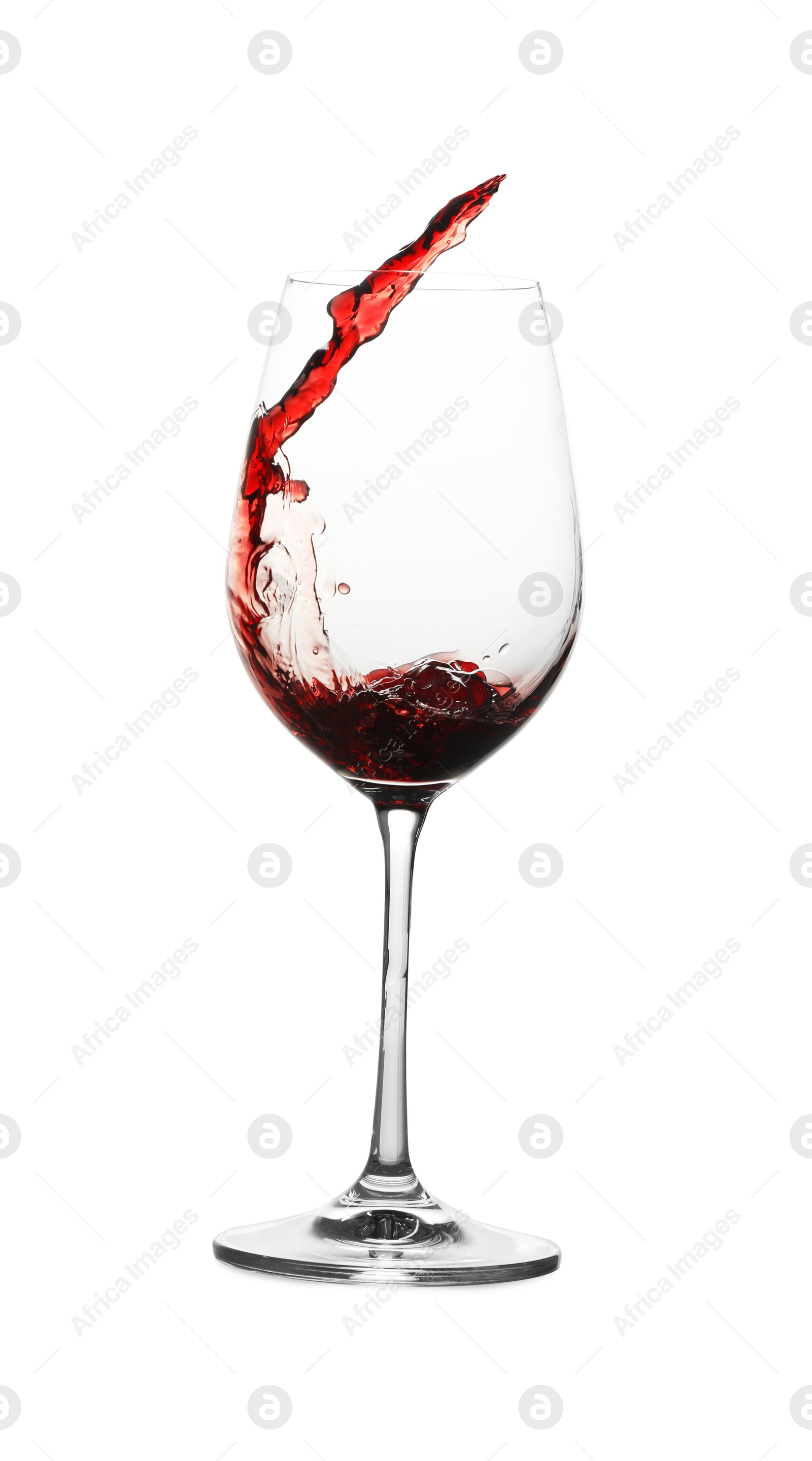 Photo of Tasty wine splashing in glass on white background