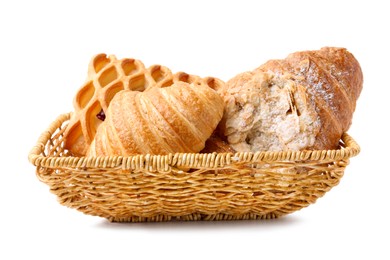 Photo of Different delicious pastries in basket isolated on white