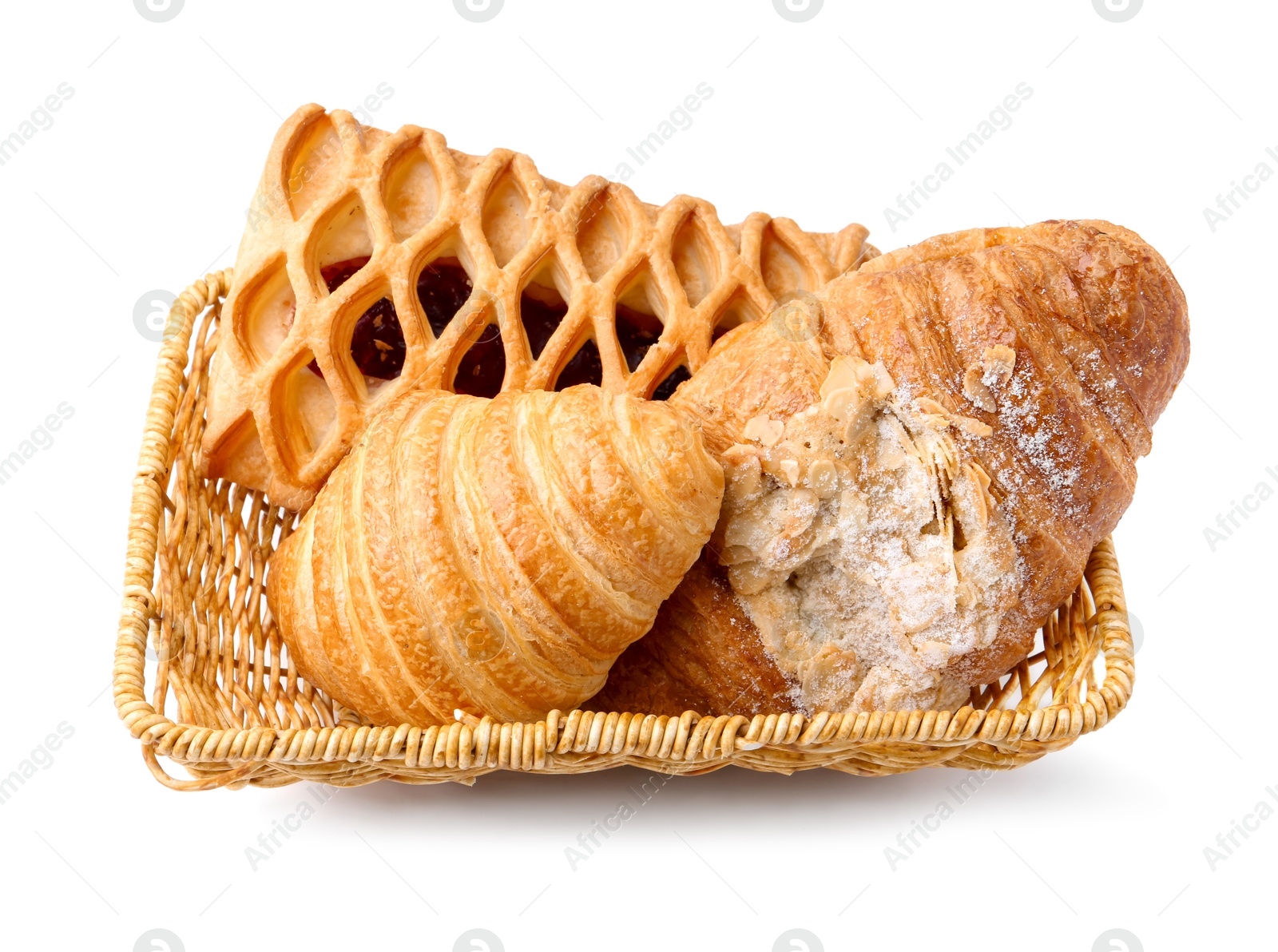 Photo of Different delicious pastries in basket isolated on white