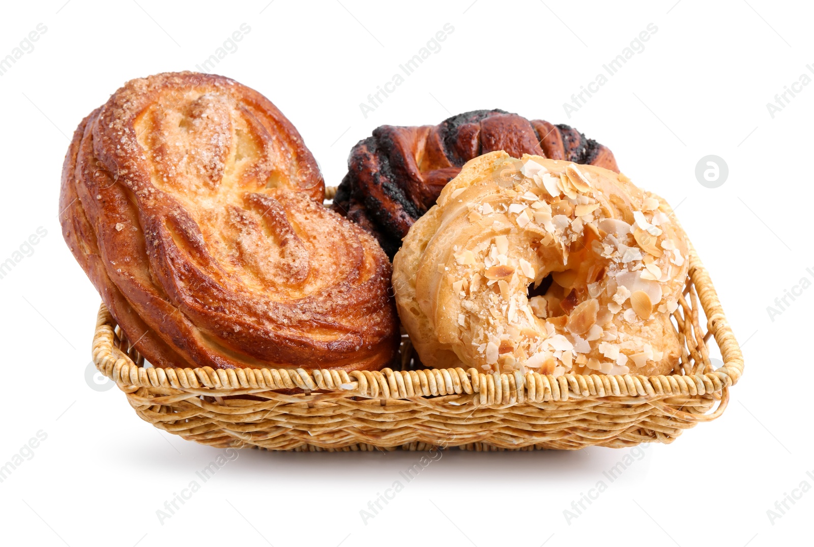 Photo of Different delicious pastries in basket isolated on white