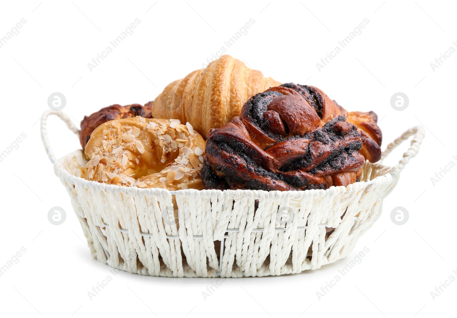 Photo of Different delicious pastries in basket isolated on white