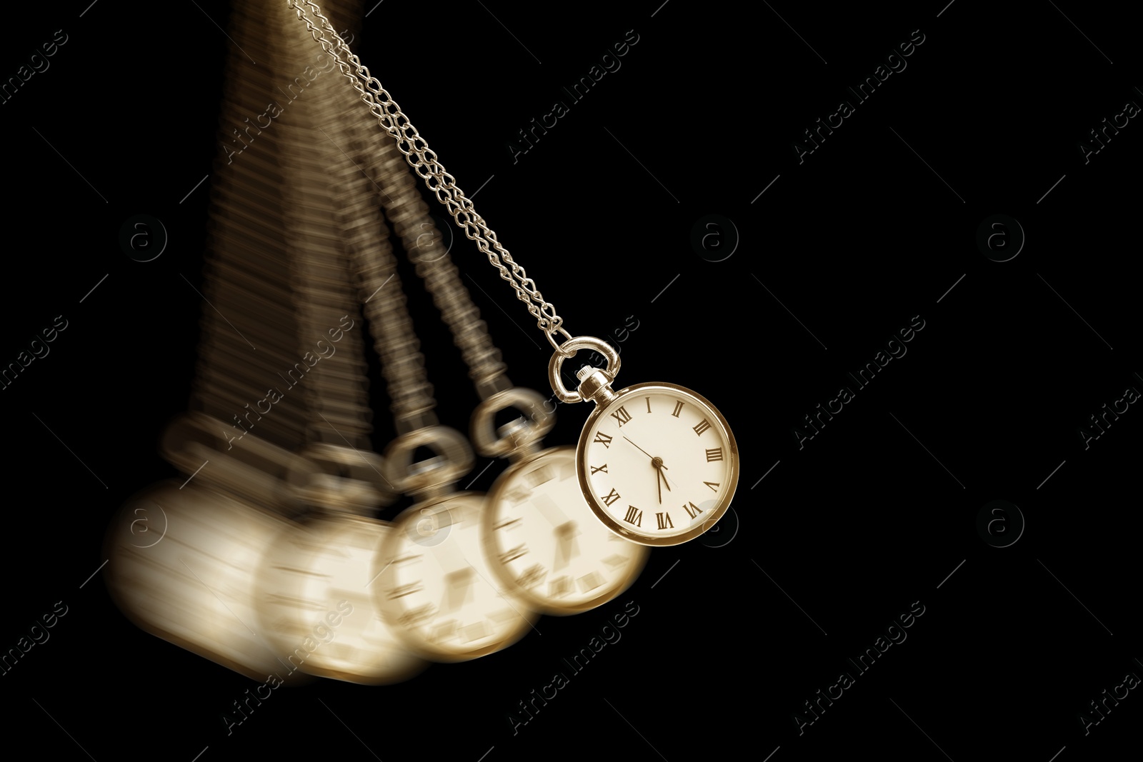 Image of Hypnosis session. Vintage pocket watch swinging on black background, motion blur effect