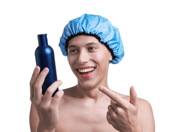 Photo of Happy man in blue shower cap with shampoo on white background