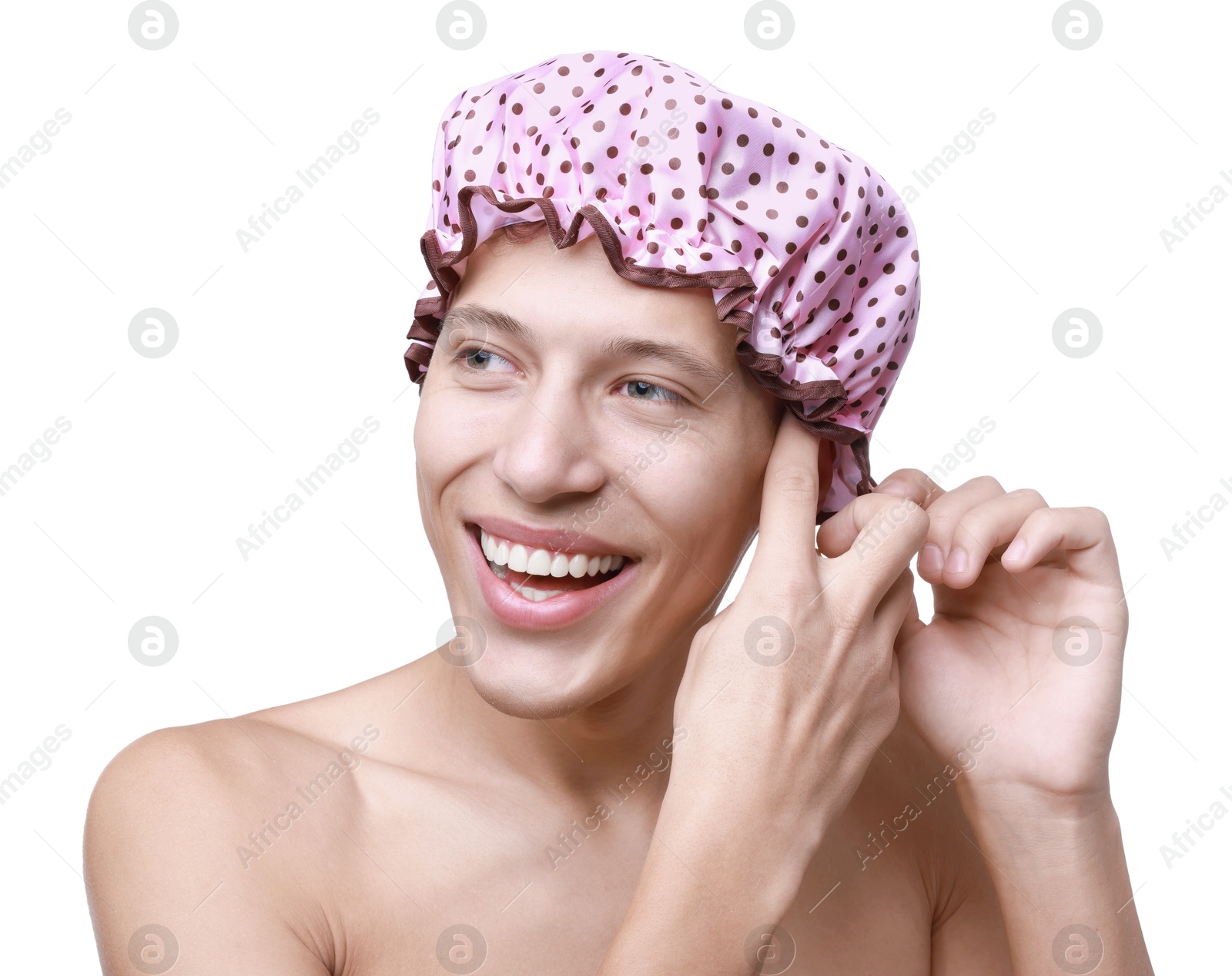 Photo of Happy man wearing pink shower cap on white background