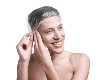 Man wearing shower cap on white background