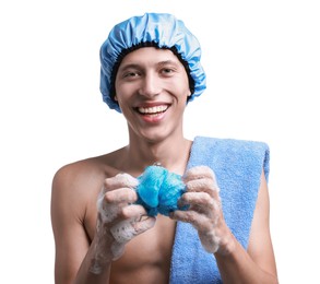 Photo of Happy man in shower cap with towel and mesh sponge on white background