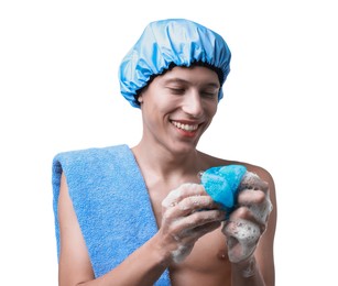 Photo of Happy man in shower cap with towel and mesh sponge on white background