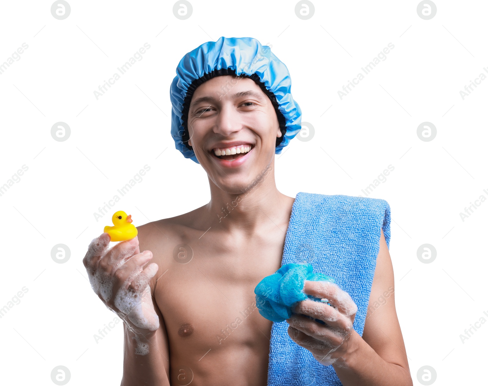 Photo of Happy man with shower cap, towel, bath duck and mesh sponge on white background