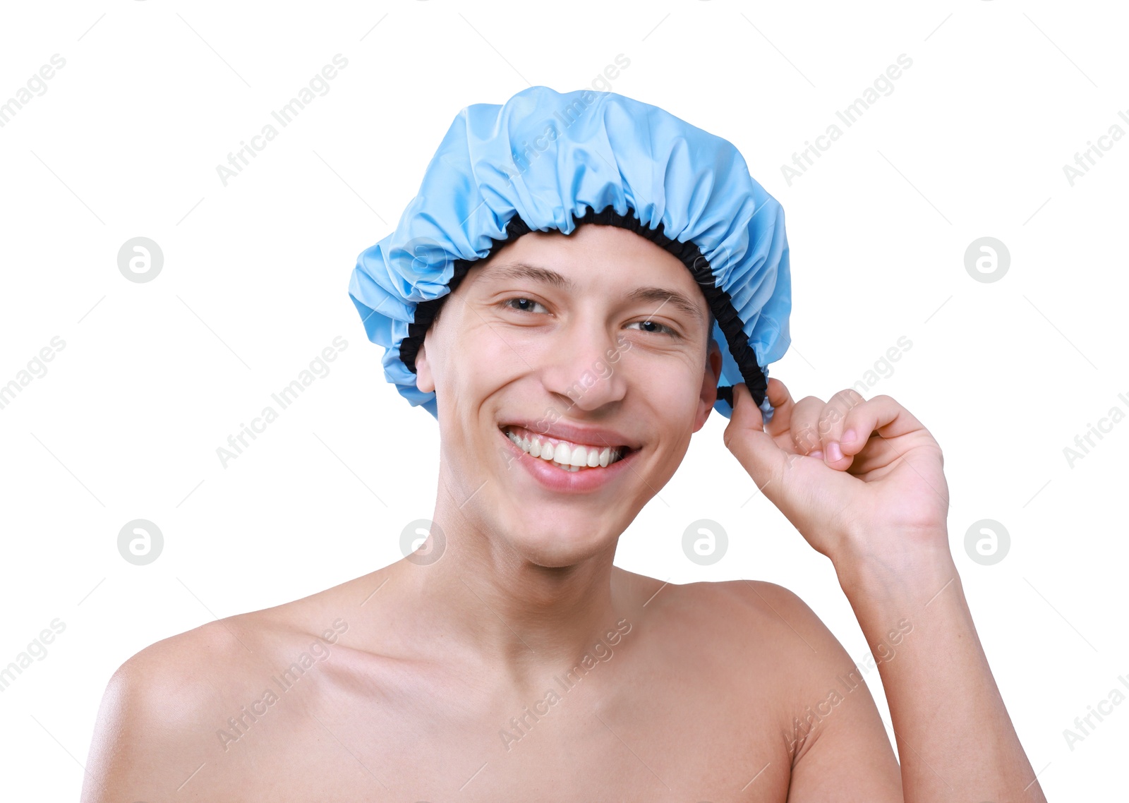 Photo of Happy man wearing shower cap on light grey background