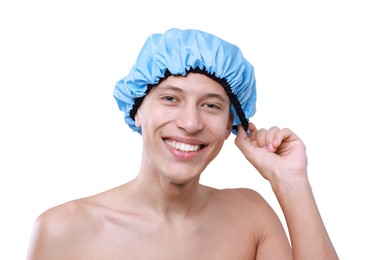 Photo of Happy man wearing shower cap on light grey background