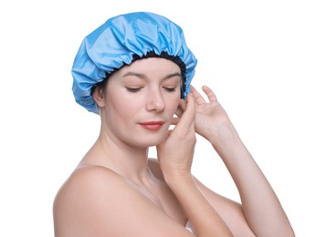 Woman wearing blue shower cap on white background