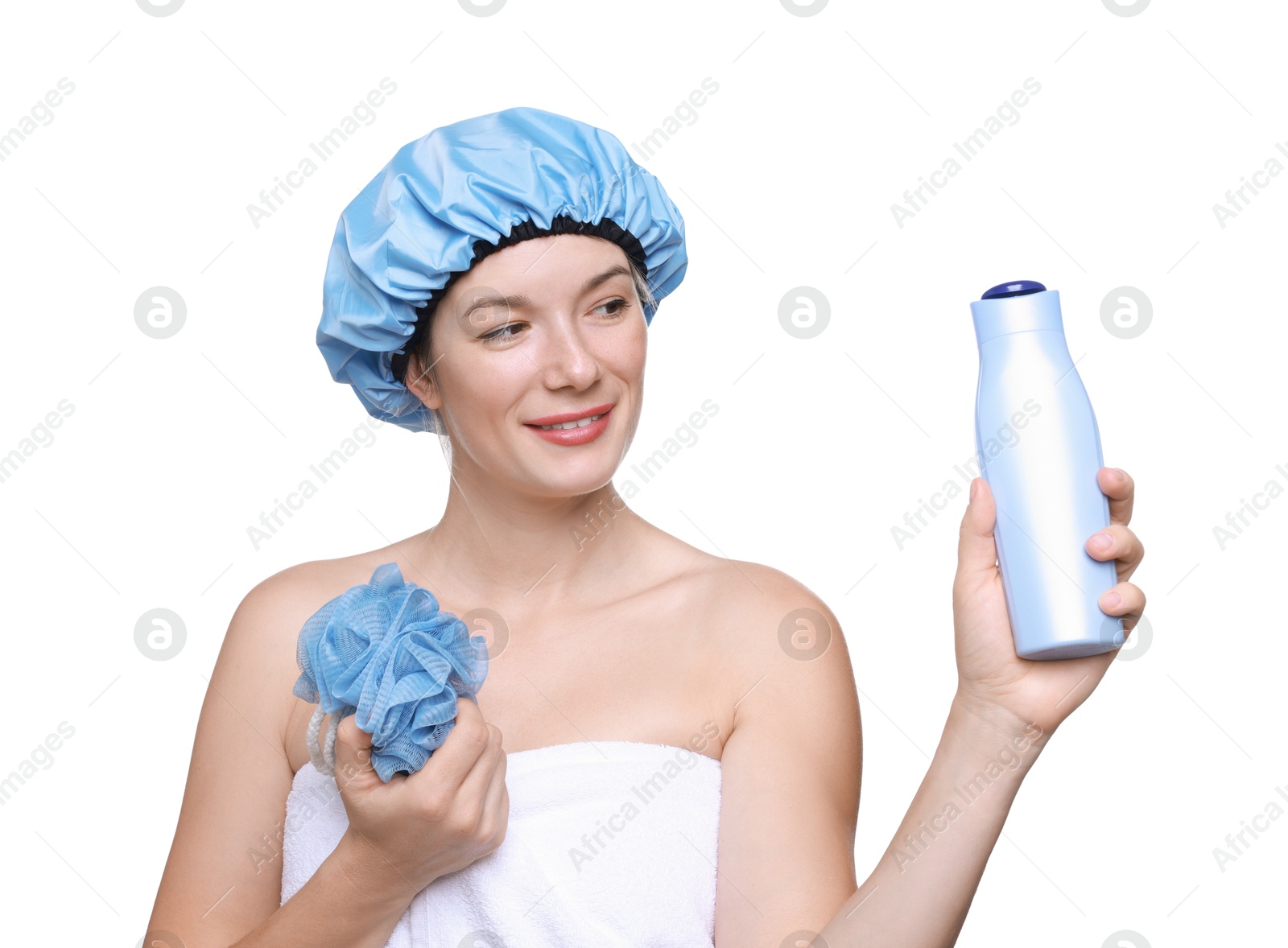 Photo of Woman with blue shower cap, mesh sponge and shampoo on white background