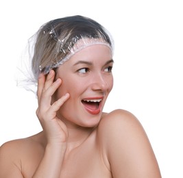 Woman in shower cap on white background