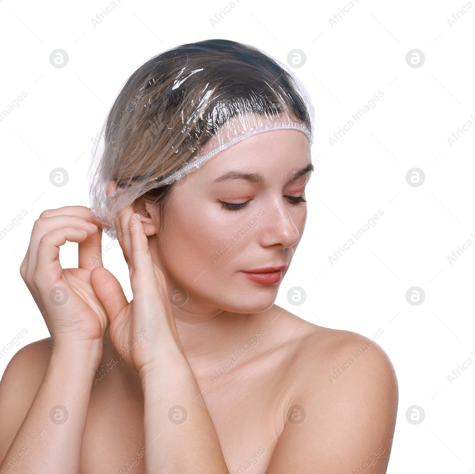 Photo of Woman wearing shower cap on white background