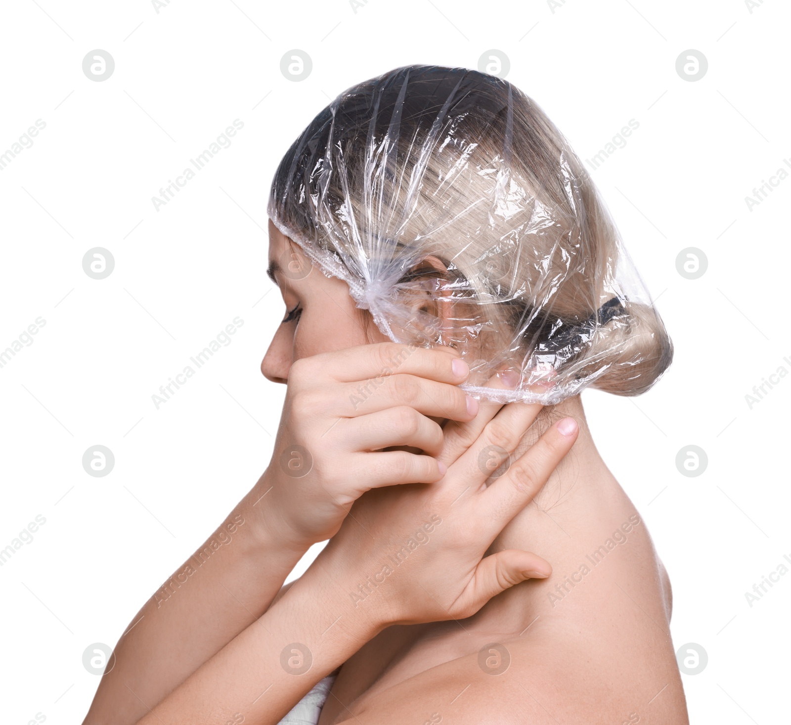 Photo of Woman wearing shower cap on white background