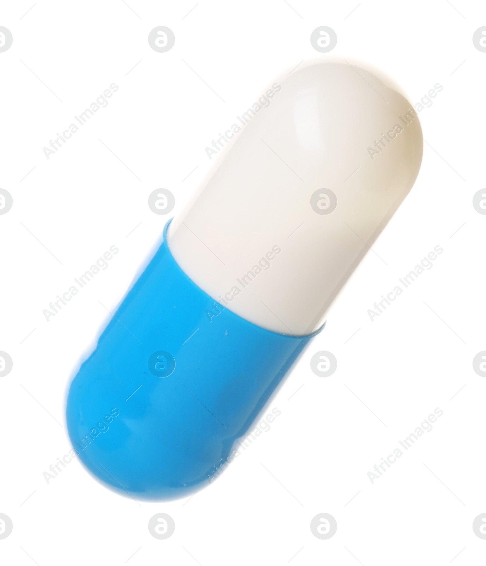 Photo of One antibiotic pill isolated on white. Medicinal treatment