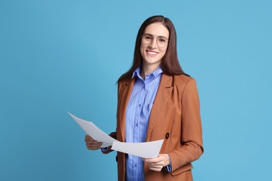 Photo of Banker with documents on light blue background