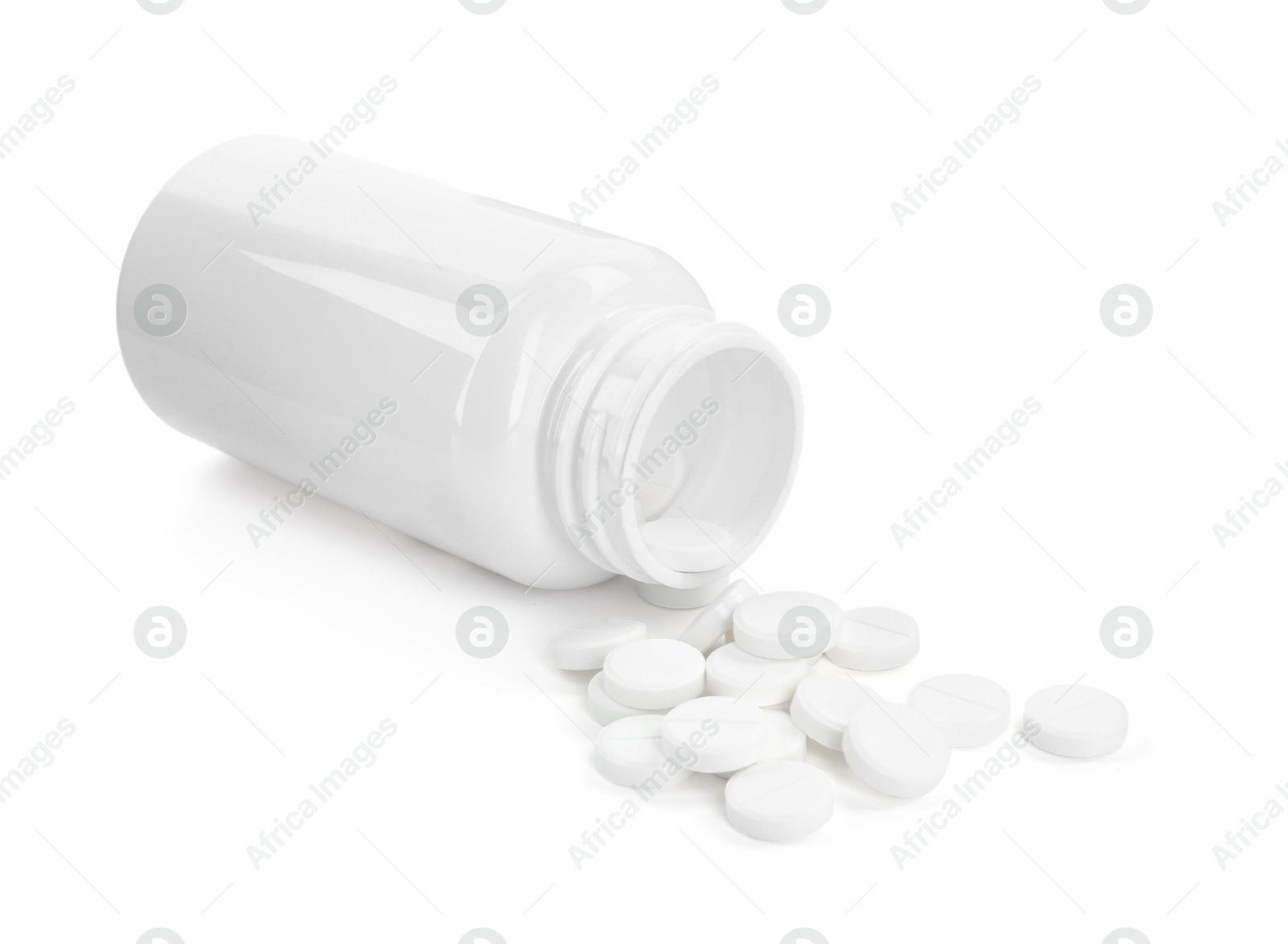 Photo of Medical bottle with antibiotic pills isolated on white