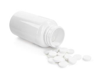 Photo of Medical bottle with antibiotic pills isolated on white