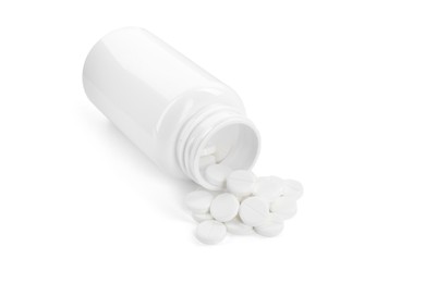 Photo of Medical bottle with antibiotic pills isolated on white