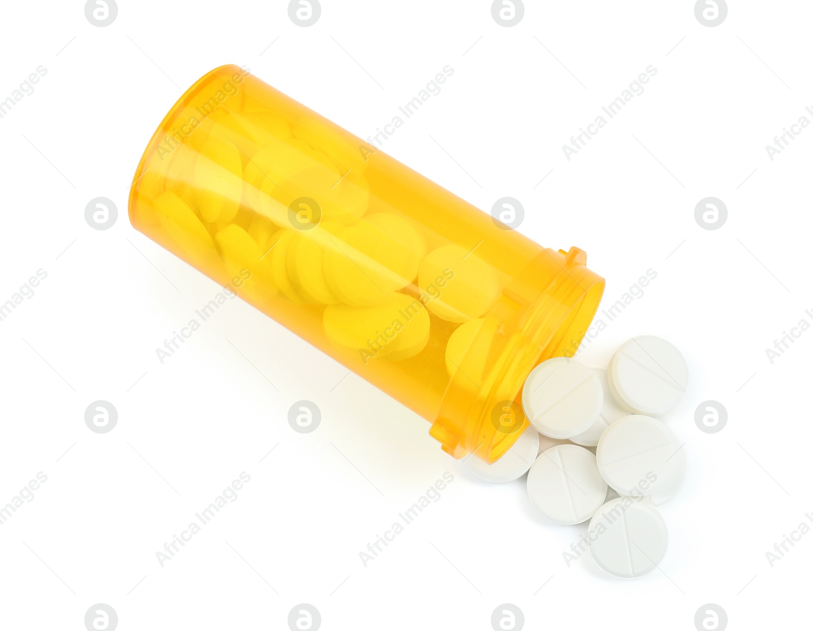 Photo of Medical bottle with antibiotic pills isolated on white, top view