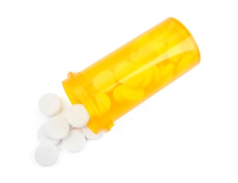 Photo of Medical bottle with antibiotic pills isolated on white, top view