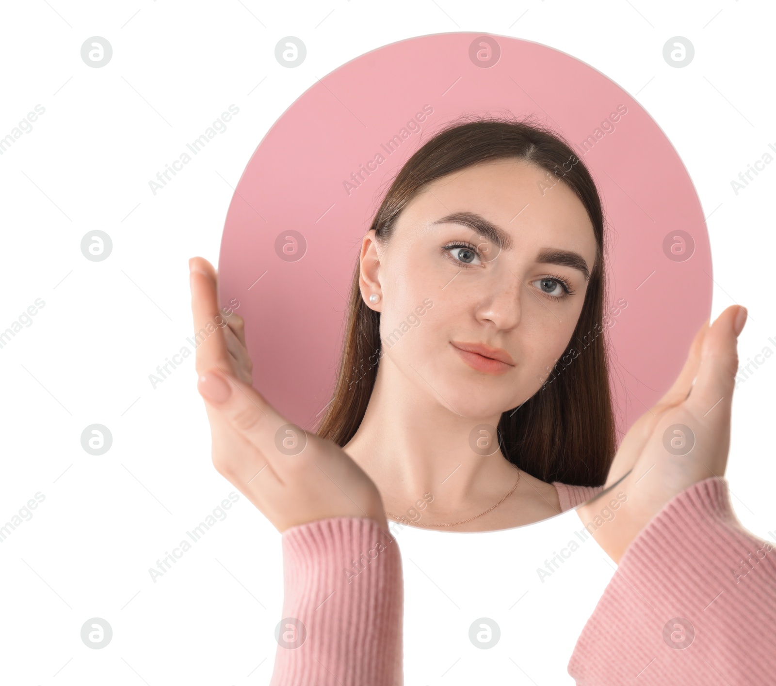 Photo of Woman holding round mirror on white background, closeup