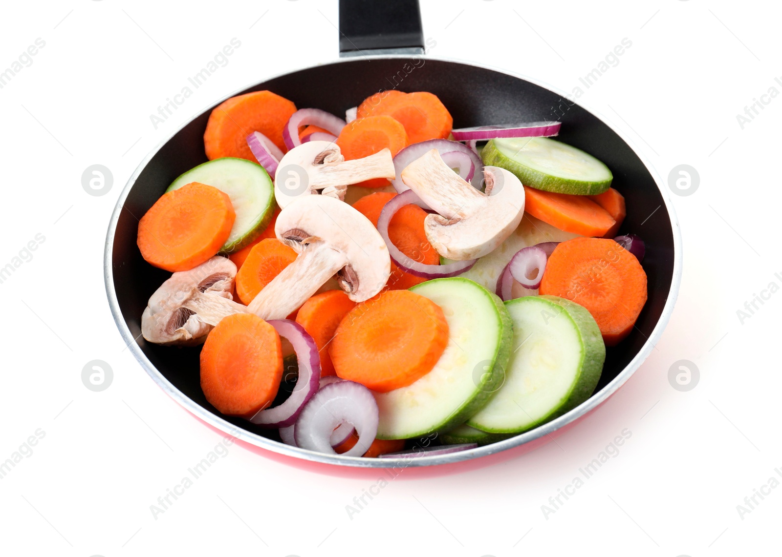 Photo of Frying pan with mix of fresh vegetables and mushrooms isolated on white