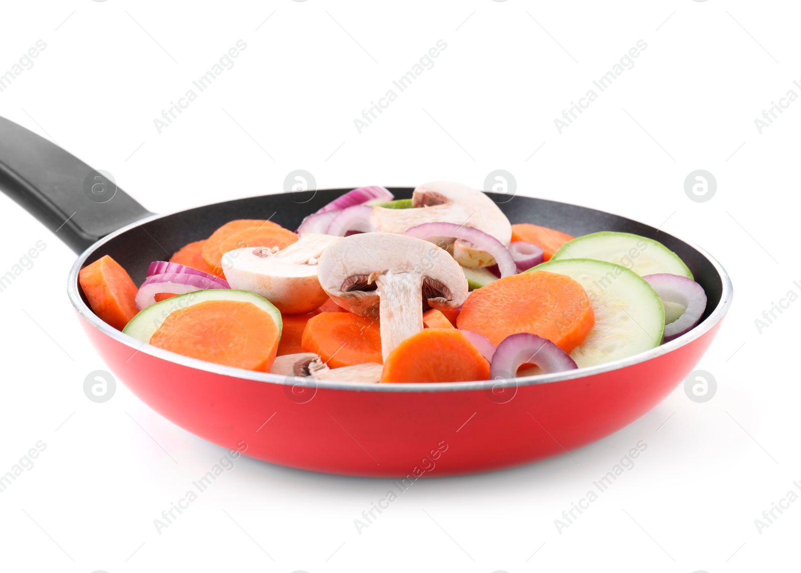 Photo of Frying pan with mix of fresh vegetables and mushrooms isolated on white