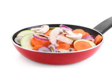 Photo of Frying pan with mix of fresh vegetables and mushrooms isolated on white