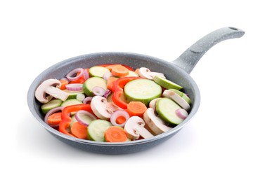 Photo of Frying pan with mix of fresh vegetables and mushrooms isolated on white