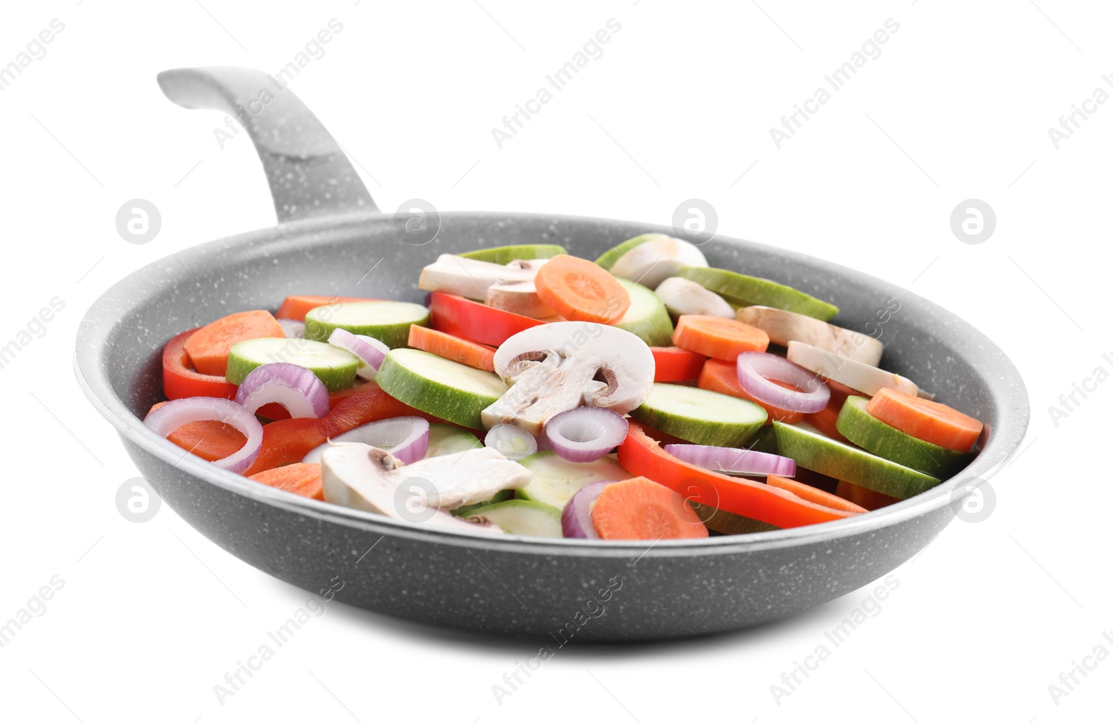 Photo of Frying pan with mix of fresh vegetables and mushrooms isolated on white