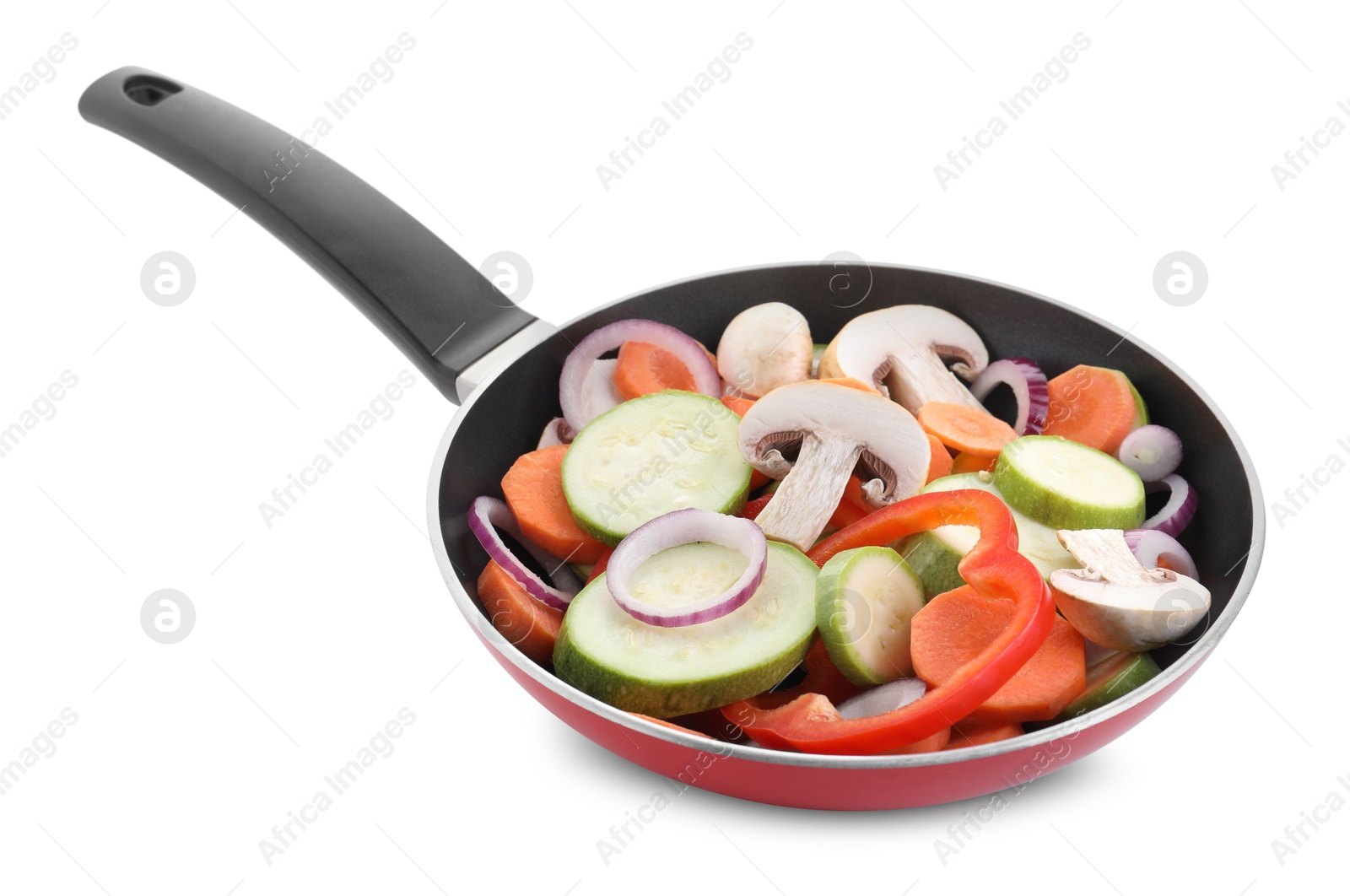 Photo of Frying pan with mix of fresh vegetables and mushrooms isolated on white