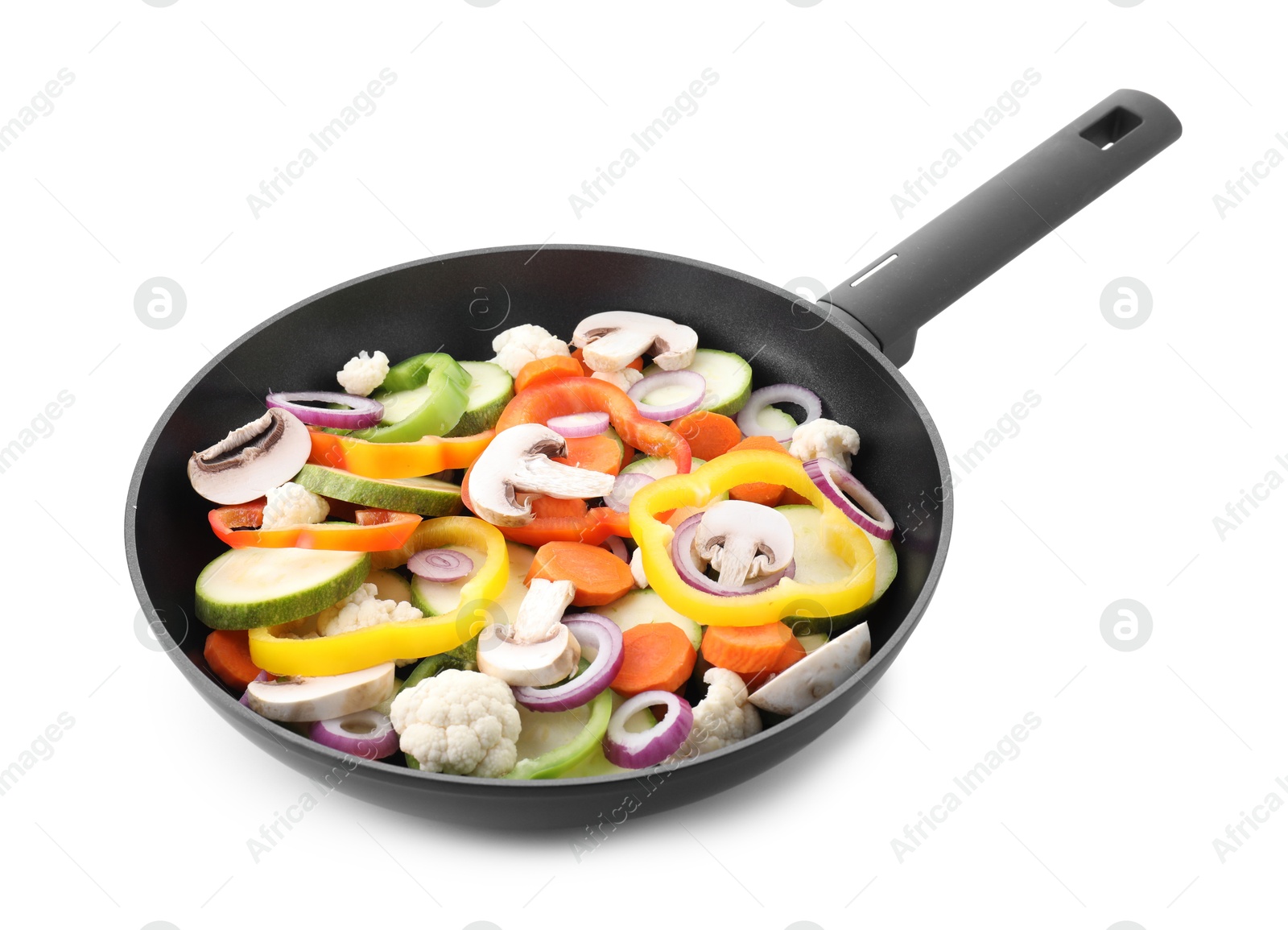 Photo of Frying pan with mix of vegetables and mushrooms in air isolated on white