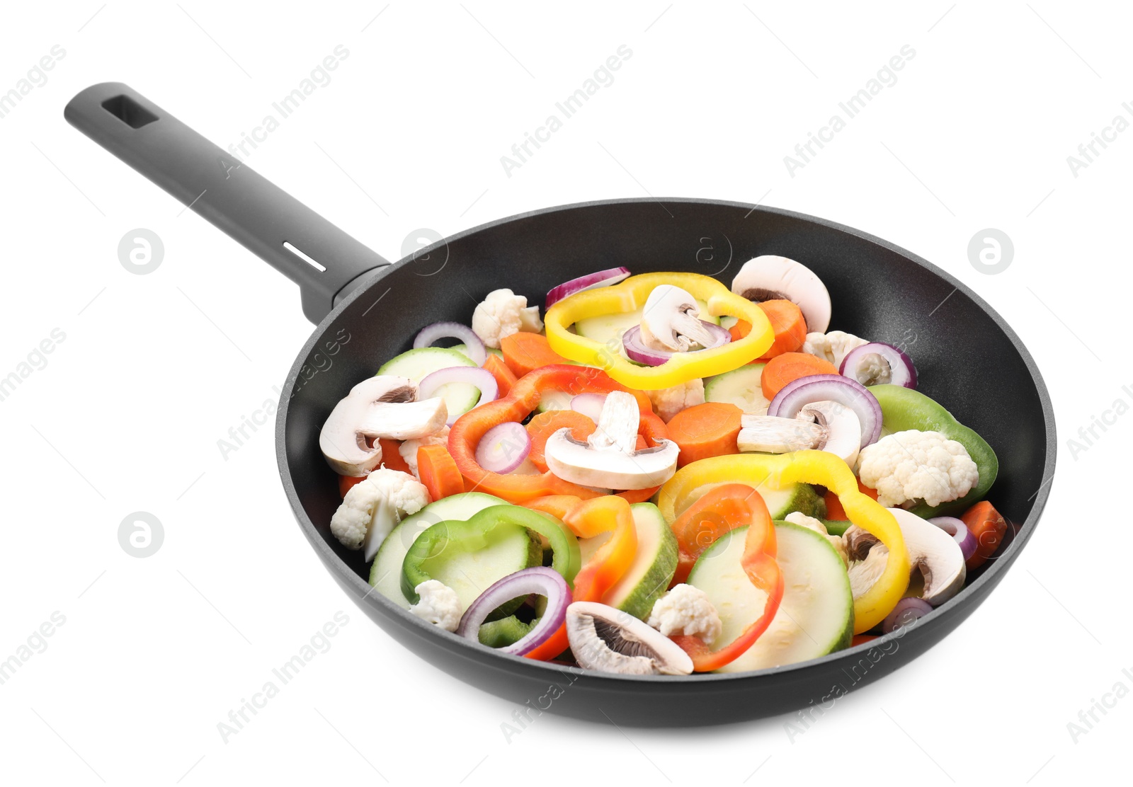 Photo of Frying pan with mix of vegetables and mushrooms in air isolated on white