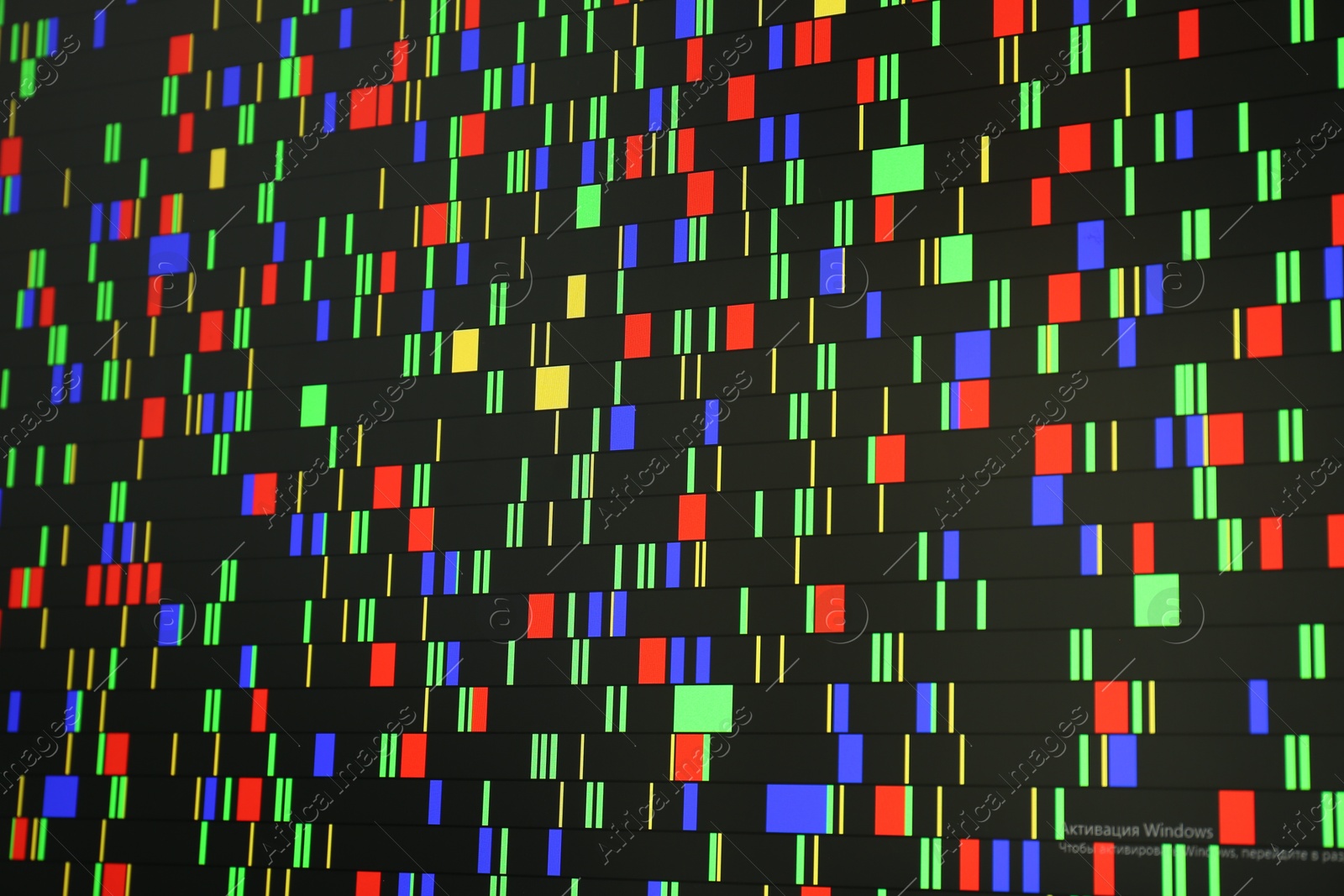 Photo of DNA analysis. Data with genetic information as background, closeup