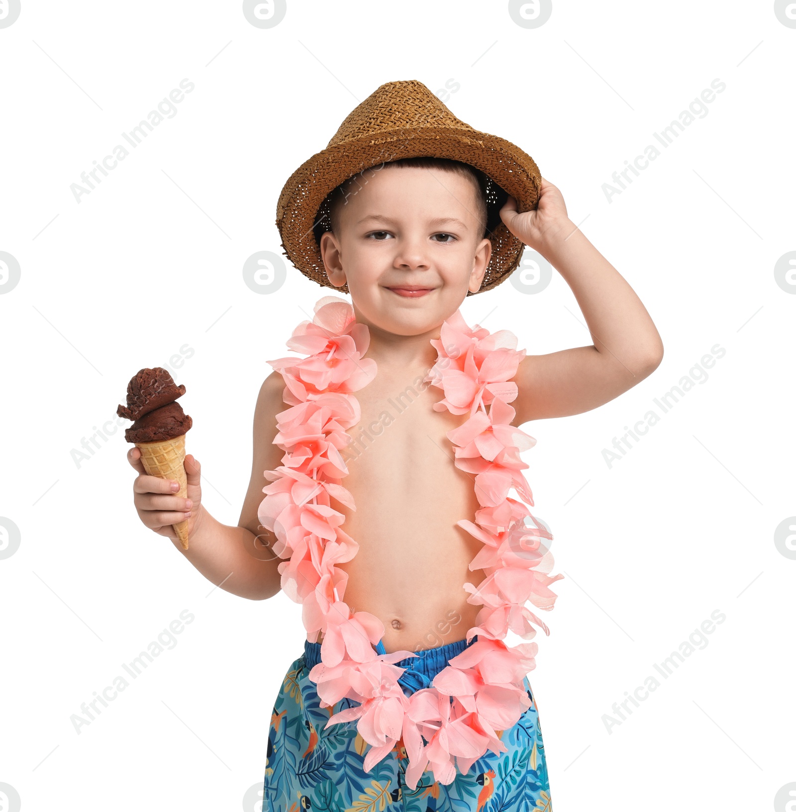 Photo of Cute little boy in beachwear with ice cream on white background