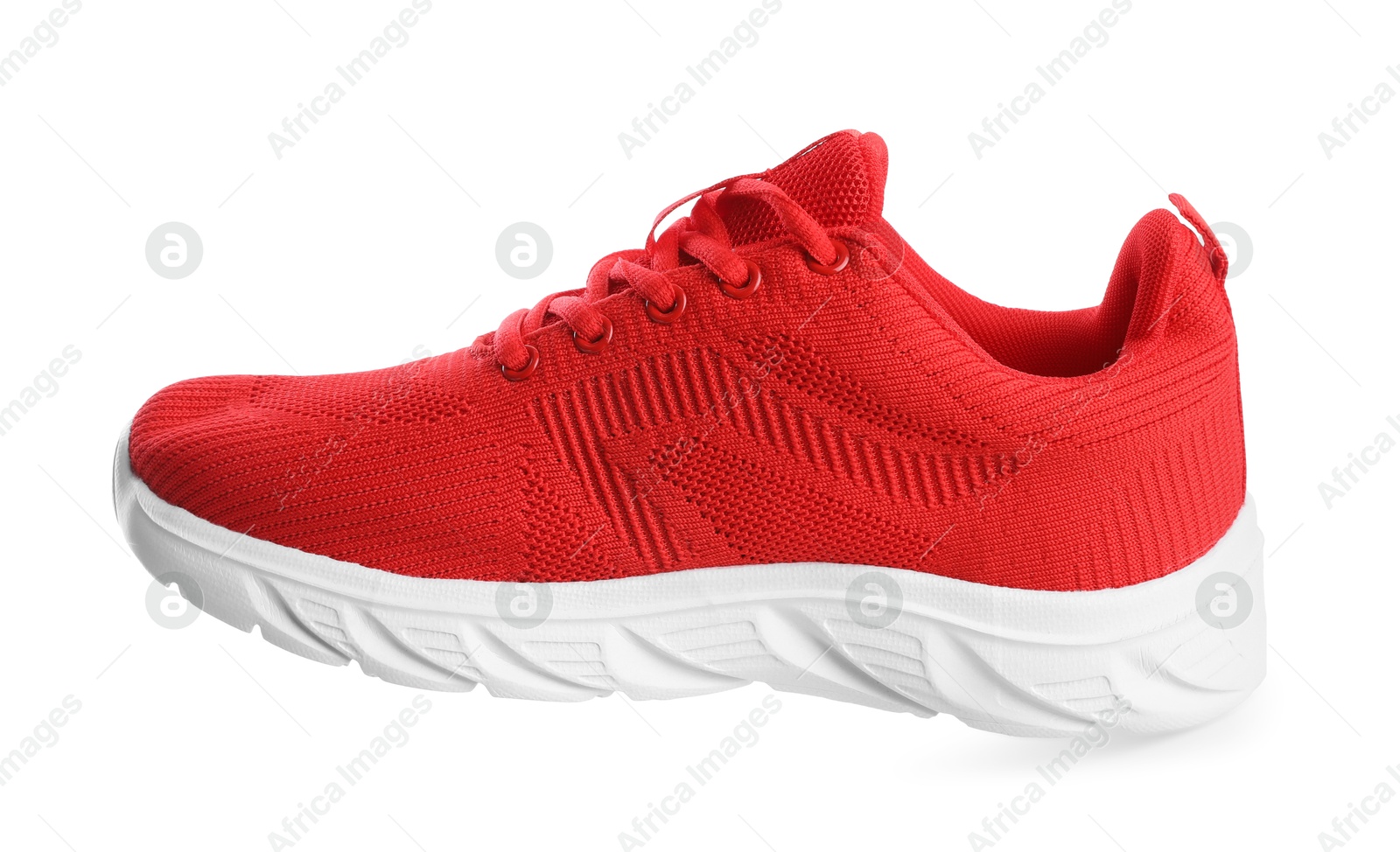 Photo of One stylish red sneaker isolated on white