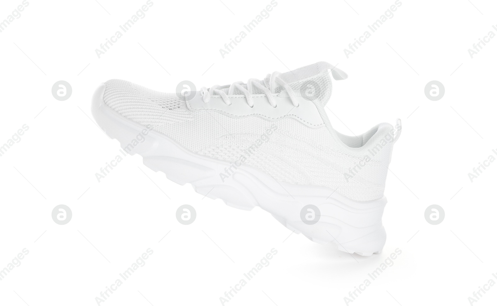 Photo of One stylish sneaker isolated on white. Comfortable footwear