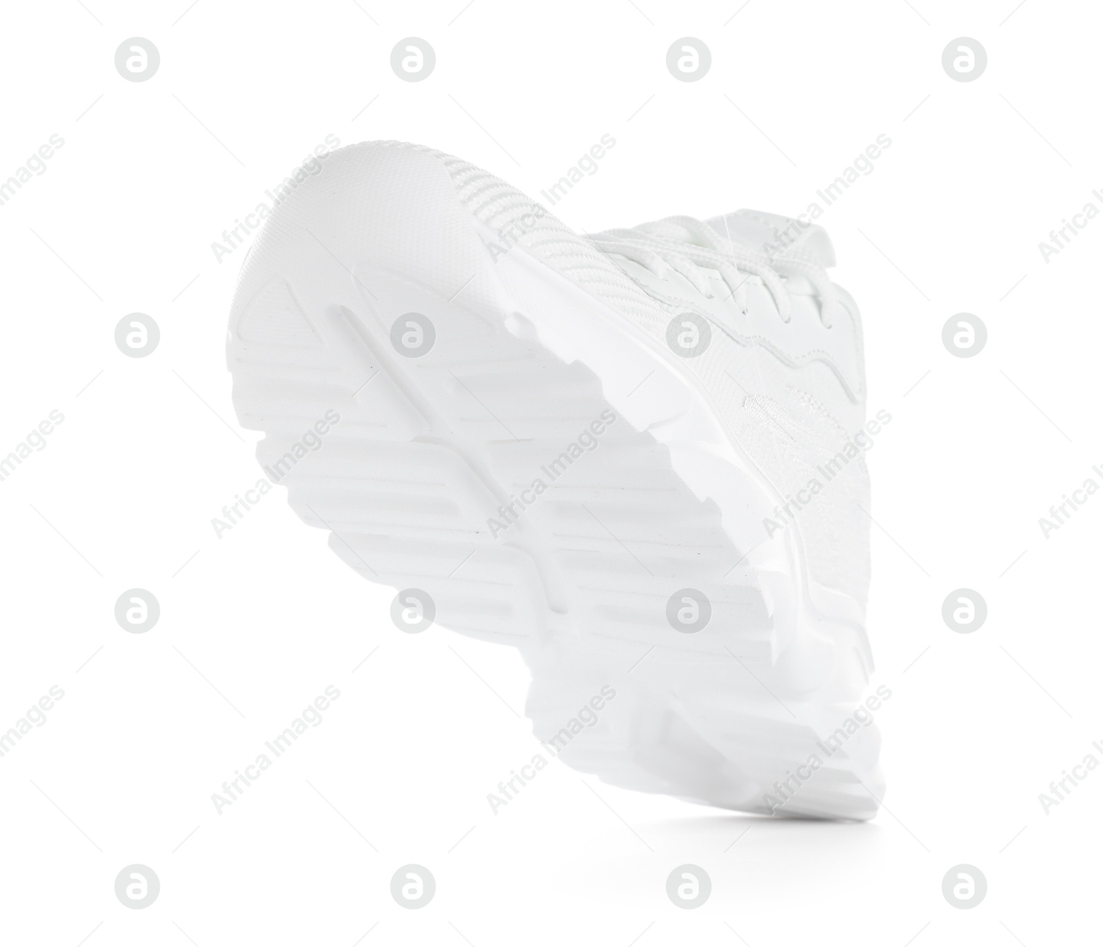 Photo of One stylish sneaker isolated on white. Comfortable footwear