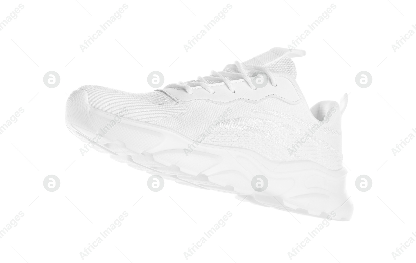 Photo of One stylish sneaker isolated on white. Comfortable footwear