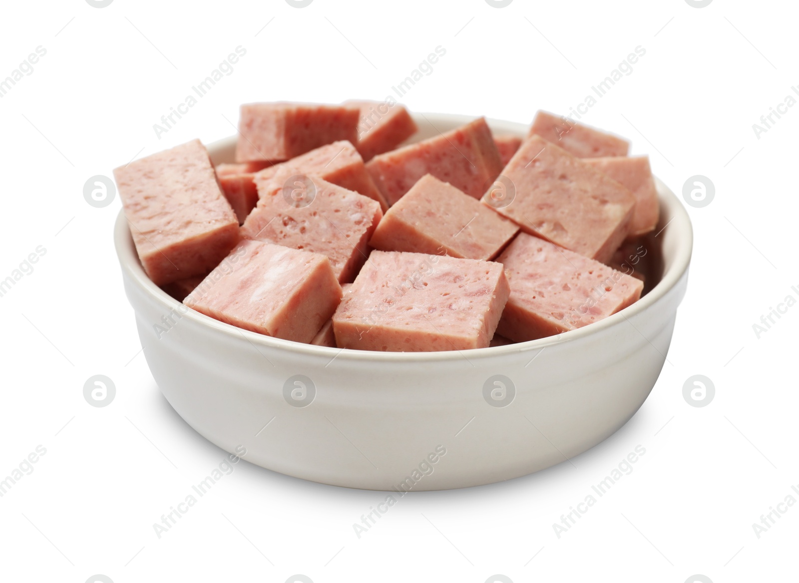 Photo of Pieces of canned meat in bowl isolated on white