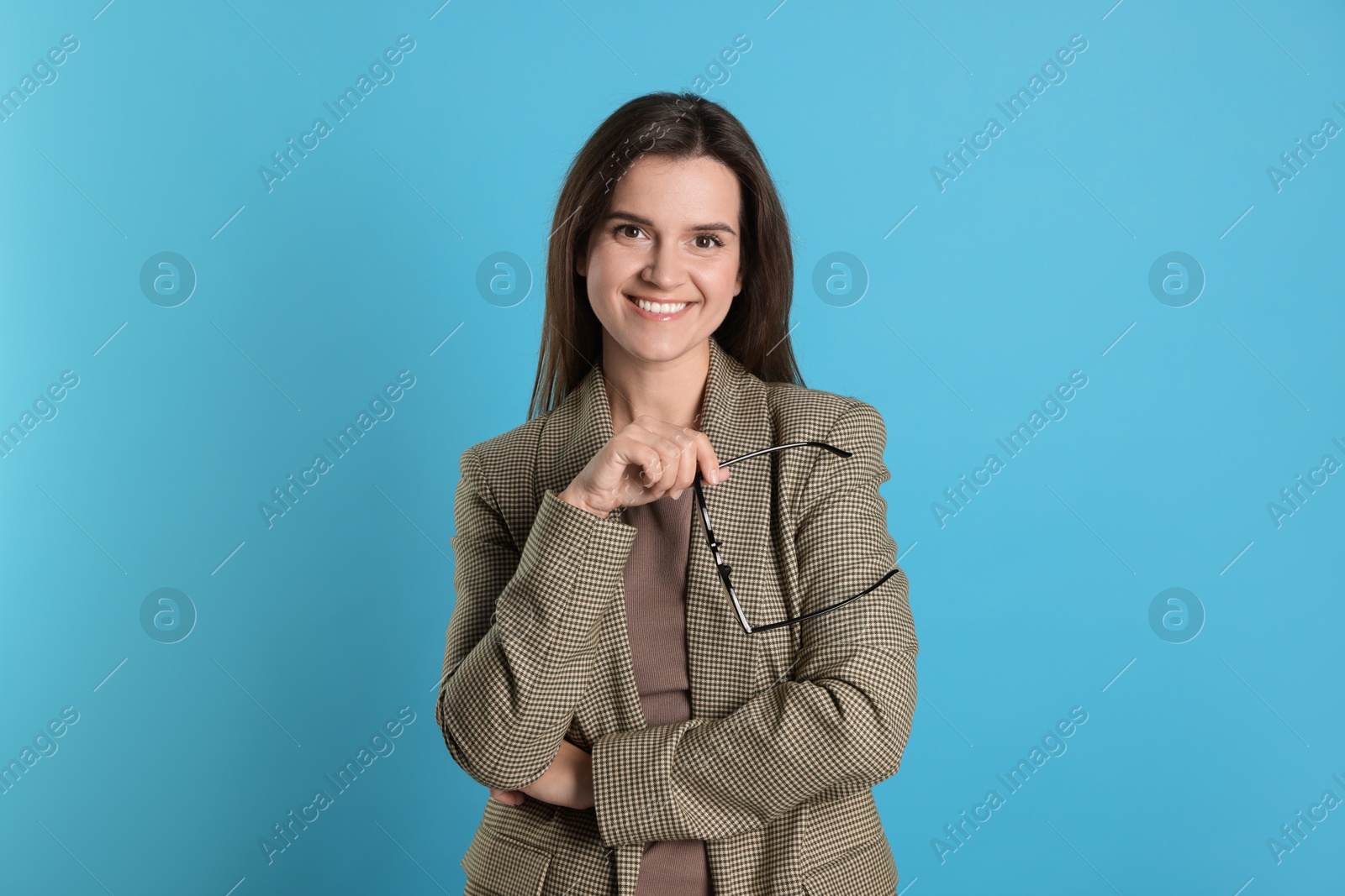 Photo of Banker with glasses on light blue background