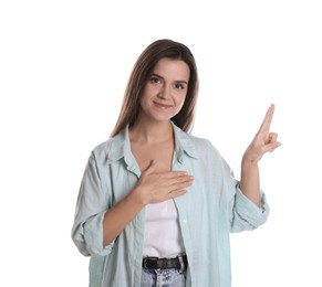 Photo of Woman showing oath gesture on white background. Making promise